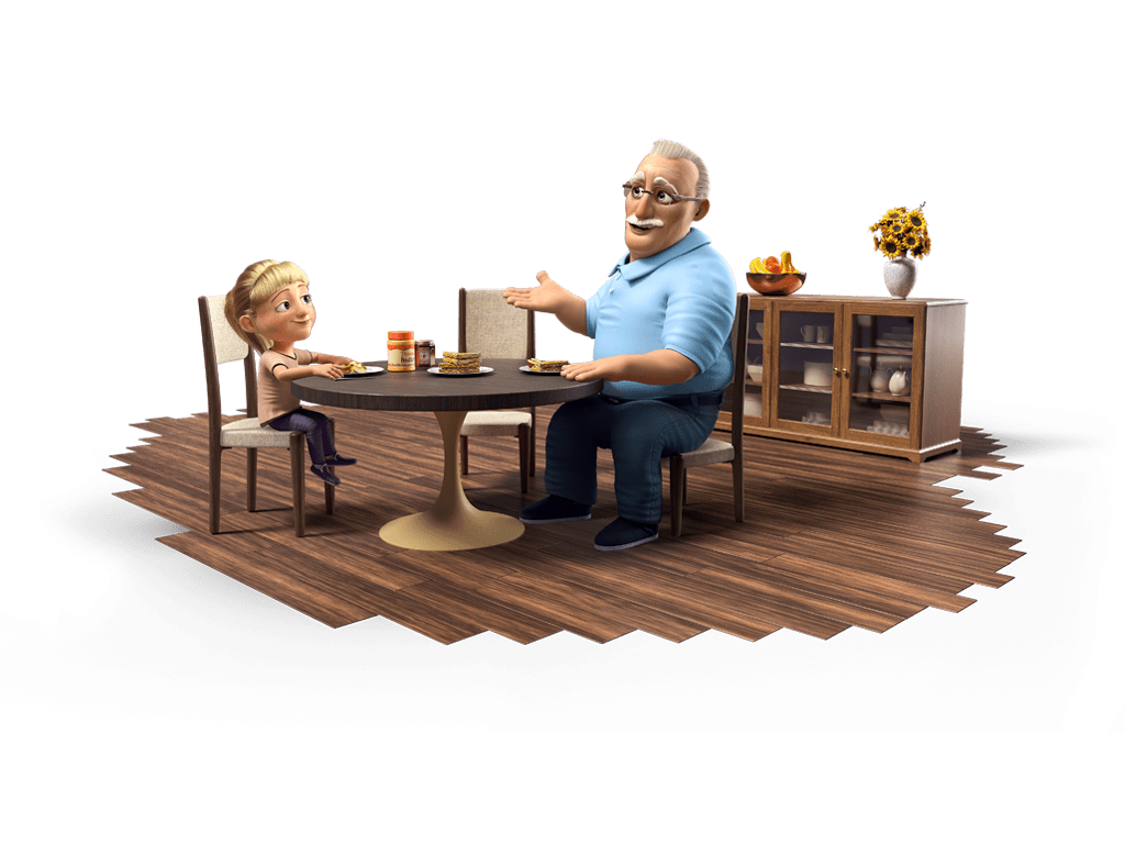Grandfather seated at a dining table sharing a snack of PB&J and apples with his granddaughter